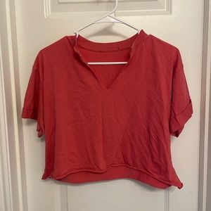Red-orange cropped top